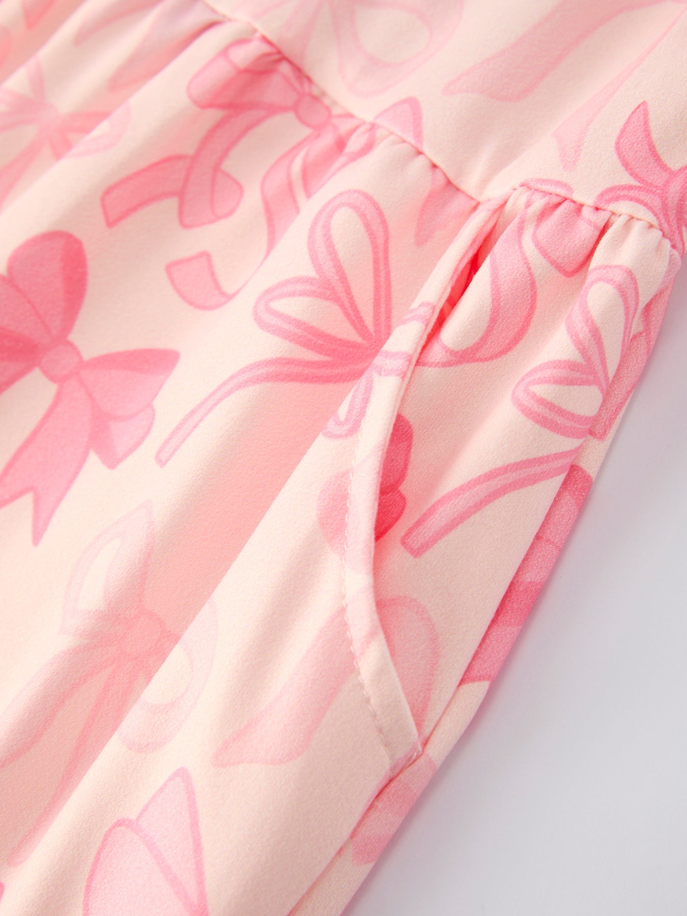 Pink Bow Print Long Sleeve Jumpsuit