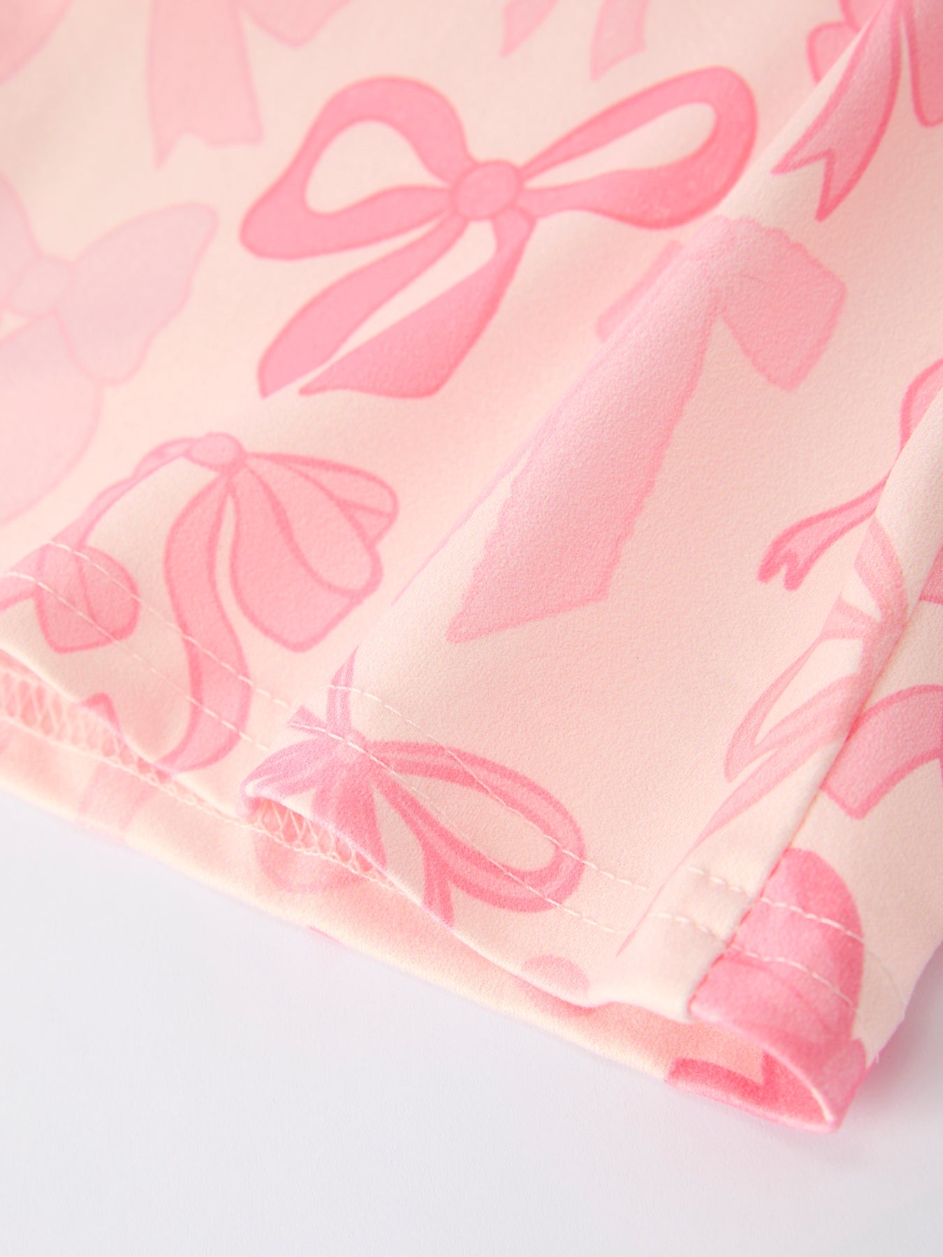 Pink Bow Print Long Sleeve Jumpsuit