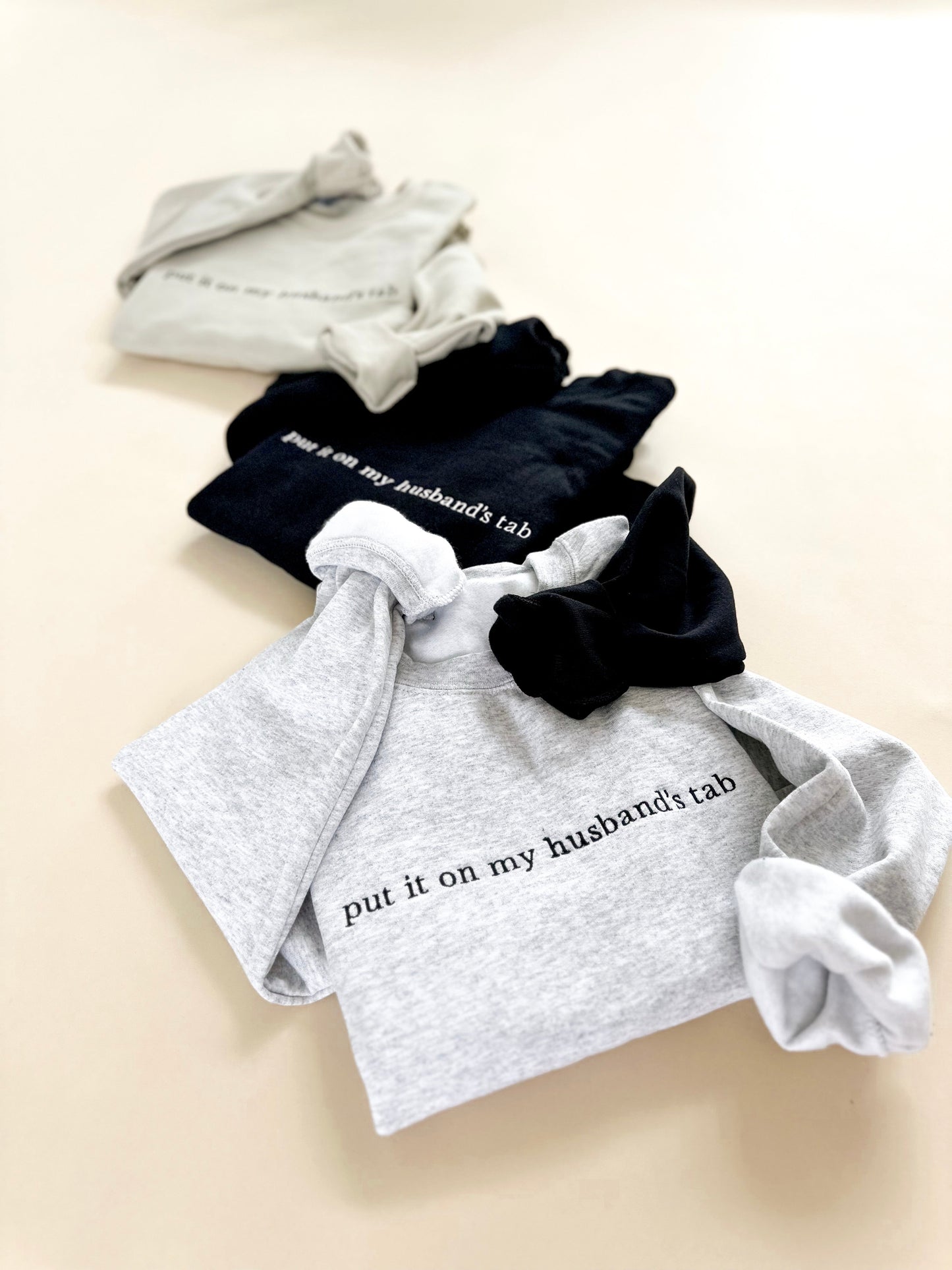 Put It On My Husband's Tab Embroidered Sweatshirt