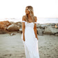 Odella Off Shoulder Dress: Smocked Maxi in Off White
