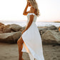 Odella Off Shoulder Dress: Smocked Maxi in Off White